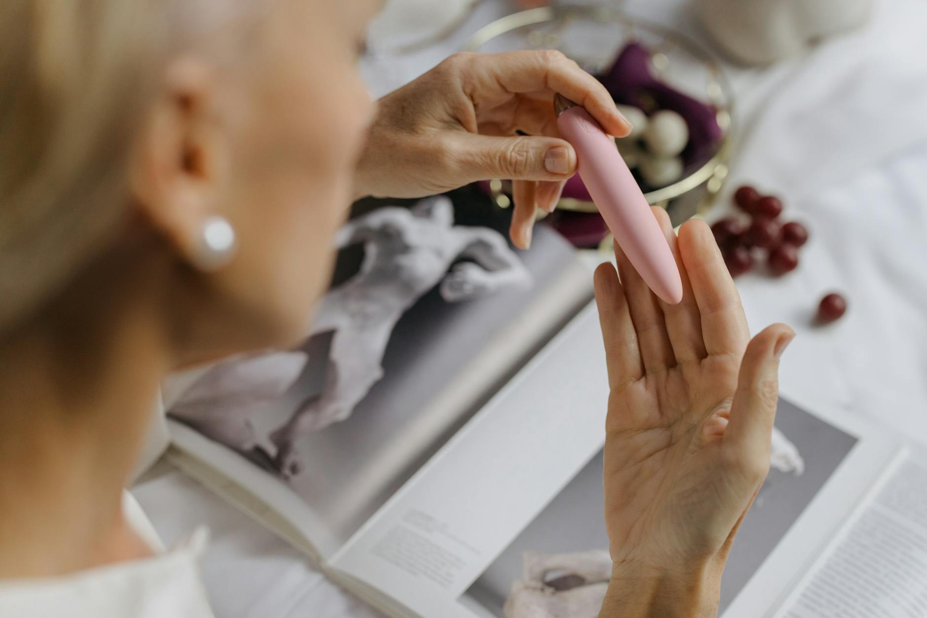 Woman holding lemon vibrators, illustrating control and choice in sexual pleasure.